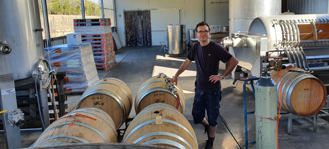 A man in the barrel room at View Wine